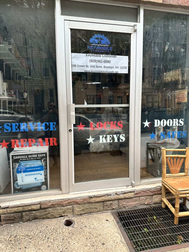 KeyMobile Locksmith shop entrance with contact details